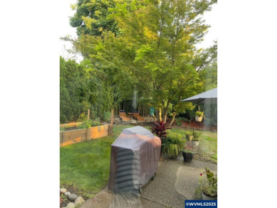 Exquisite home features vaulted ceilings & arched windows