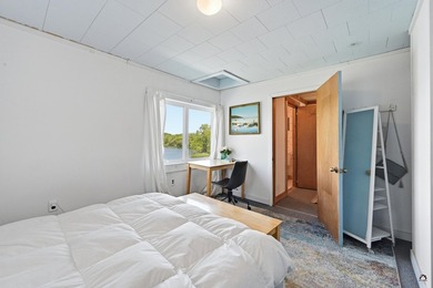 A rare opportunity to enjoy spacious riverfront living in the - photo 40