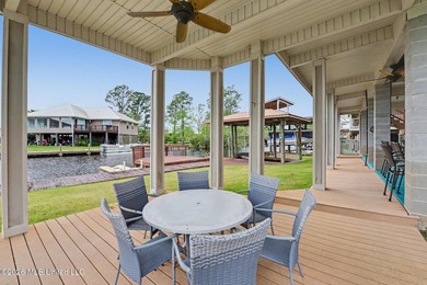 Tucked away in the serene waterfront community of Jourdan River - photo 33