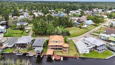 Tucked away in the serene waterfront community of Jourdan River - photo 42