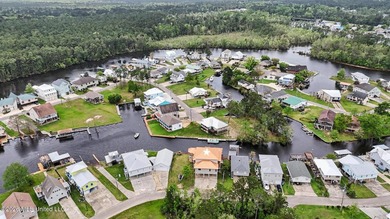 Tucked away in the serene waterfront community of Jourdan River - photo 46