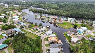 Tucked away in the serene waterfront community of Jourdan River - photo 47