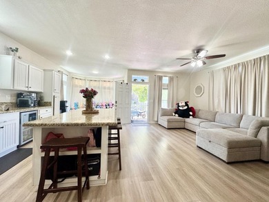 Beautiful and spacious 3-bedroom, 2-bathroom mobile home located - photo 2