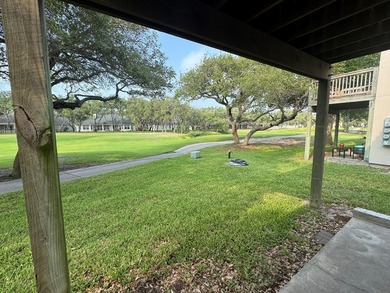 Highly sought after ground floor corner end unit overlooking the - photo 3