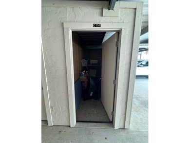 Highly sought after ground floor corner end unit overlooking the - photo 9