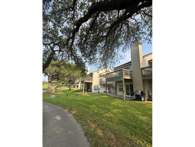 Highly sought after ground floor corner end unit overlooking the - photo 10