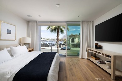 Welcome to an exceptional coastal residence in the coveted Lido