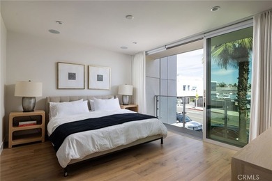 Welcome to an exceptional coastal residence in the coveted Lido