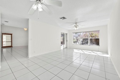 This light-filled home welcomes you into a spacious living room - photo 5