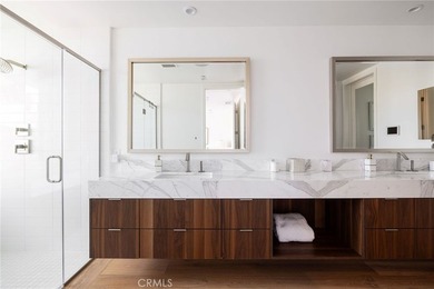 Welcome to an exceptional coastal residence in the coveted Lido