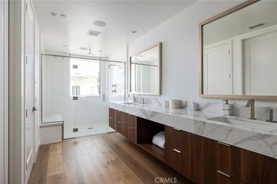 Welcome to an exceptional coastal residence in the coveted Lido