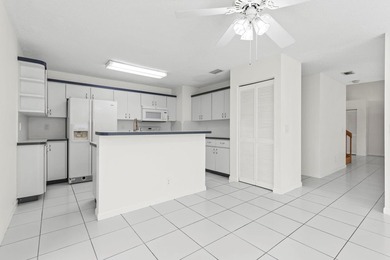 This light-filled home welcomes you into a spacious living room - photo 7