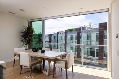 Welcome to an exceptional coastal residence in the coveted Lido