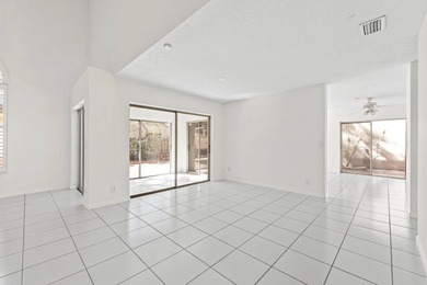 This light-filled home welcomes you into a spacious living room - photo 9