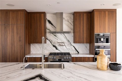 Welcome to an exceptional coastal residence in the coveted Lido