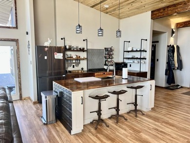 This custom 2024 mountain contemporary home sits on 20 acres - photo 15