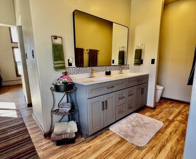 This custom 2024 mountain contemporary home sits on 20 acres - photo 24