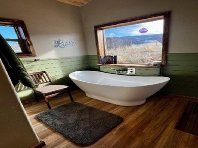 This custom 2024 mountain contemporary home sits on 20 acres - photo 28