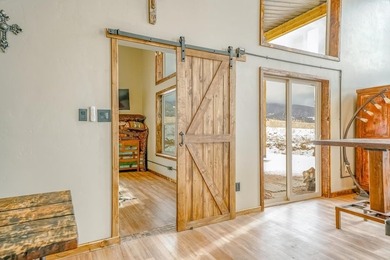 This custom 2024 mountain contemporary home sits on 20 acres - photo 34
