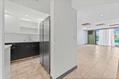 Stylishly updated 2-bedroom, 1.5-bathroom corner unit in the - photo 4