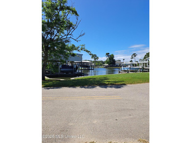 Lot is on the #4 tee box of the Pass Christian Isles Golf Course - photo 3