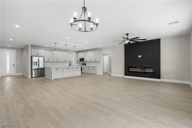 This brand new construction home in Artesia is packed w/upgrades