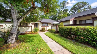Welcome to this charming 2-bedroom, 2-bathroom villa situated in - photo 1