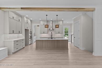 Welcome to luxury living in the coveted Marsh Landing Place!