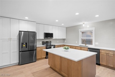 An opportunity to own a masterfully renovated century home, in - photo 18