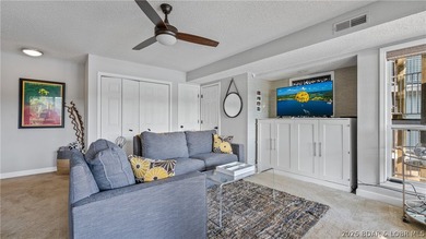 Check out this TWO story lakefront condo at the beautiful Shores - photo 16