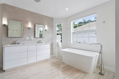 Welcome to this exceptional residence in the prestigious gated - photo 18