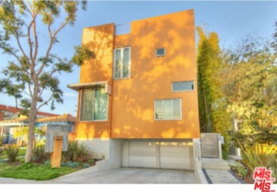 An architectural multi-unit compound centrally located in the - photo 1