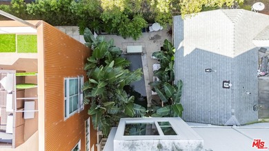 An architectural multi-unit compound centrally located in the - photo 3