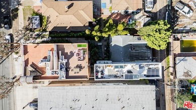An architectural multi-unit compound centrally located in the - photo 4