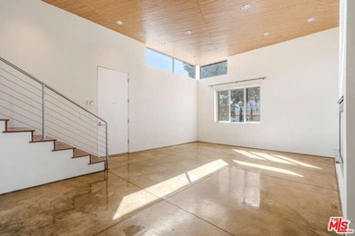 An architectural multi-unit compound centrally located in the - photo 10