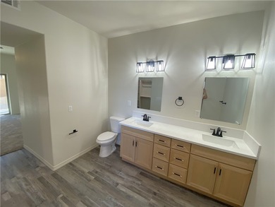 Looking for a luxurious, beautiful GROUND floor condo that feels