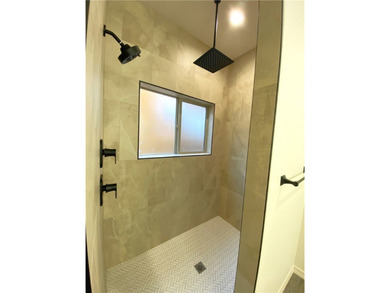 Looking for a luxurious, beautiful GROUND floor condo that feels