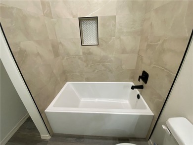 Looking for a luxurious, beautiful GROUND floor condo that feels