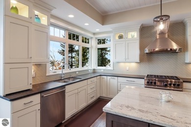 Exquisite Craftsman home with extensive sandy beach front on - photo 8