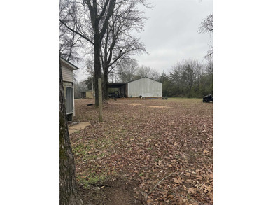 Enjoy life in country.  This 4 bedroom 3 bathroom triple wide on