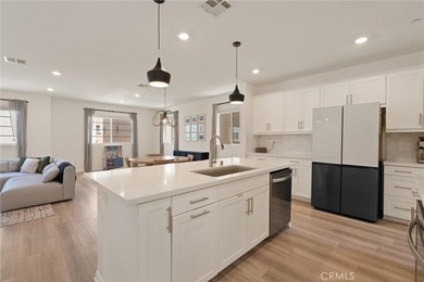 Welcome to this stunning, detached 2022-built home in the highly - photo 6