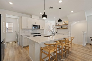 Welcome to this stunning, detached 2022-built home in the highly - photo 7
