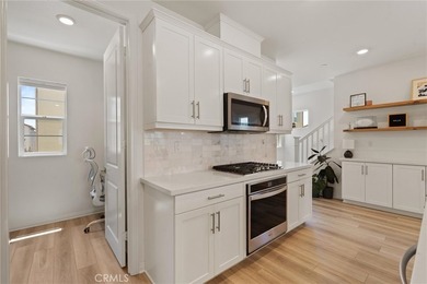 Welcome to this stunning, detached 2022-built home in the highly - photo 9