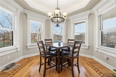 Set on the private waters of Treeline Lake in Four Seasons, this - photo 14