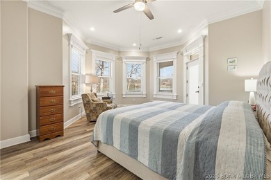 Set on the private waters of Treeline Lake in Four Seasons, this - photo 17