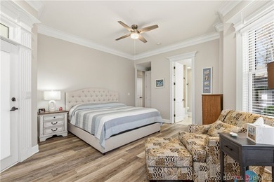Set on the private waters of Treeline Lake in Four Seasons, this - photo 18