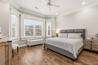 Set on the private waters of Treeline Lake in Four Seasons, this - photo 21