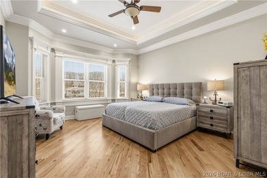 Set on the private waters of Treeline Lake in Four Seasons, this - photo 23