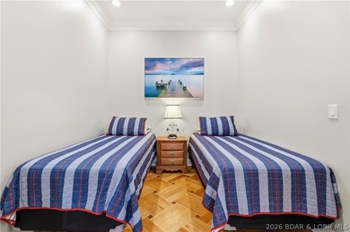 Set on the private waters of Treeline Lake in Four Seasons, this - photo 25