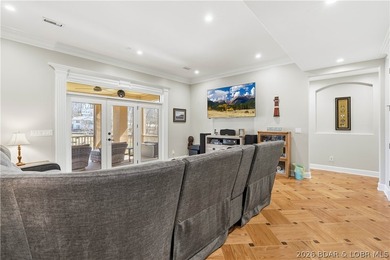 Set on the private waters of Treeline Lake in Four Seasons, this - photo 26